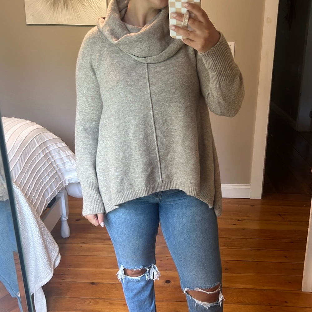 Kaisely tan sweater; size medium